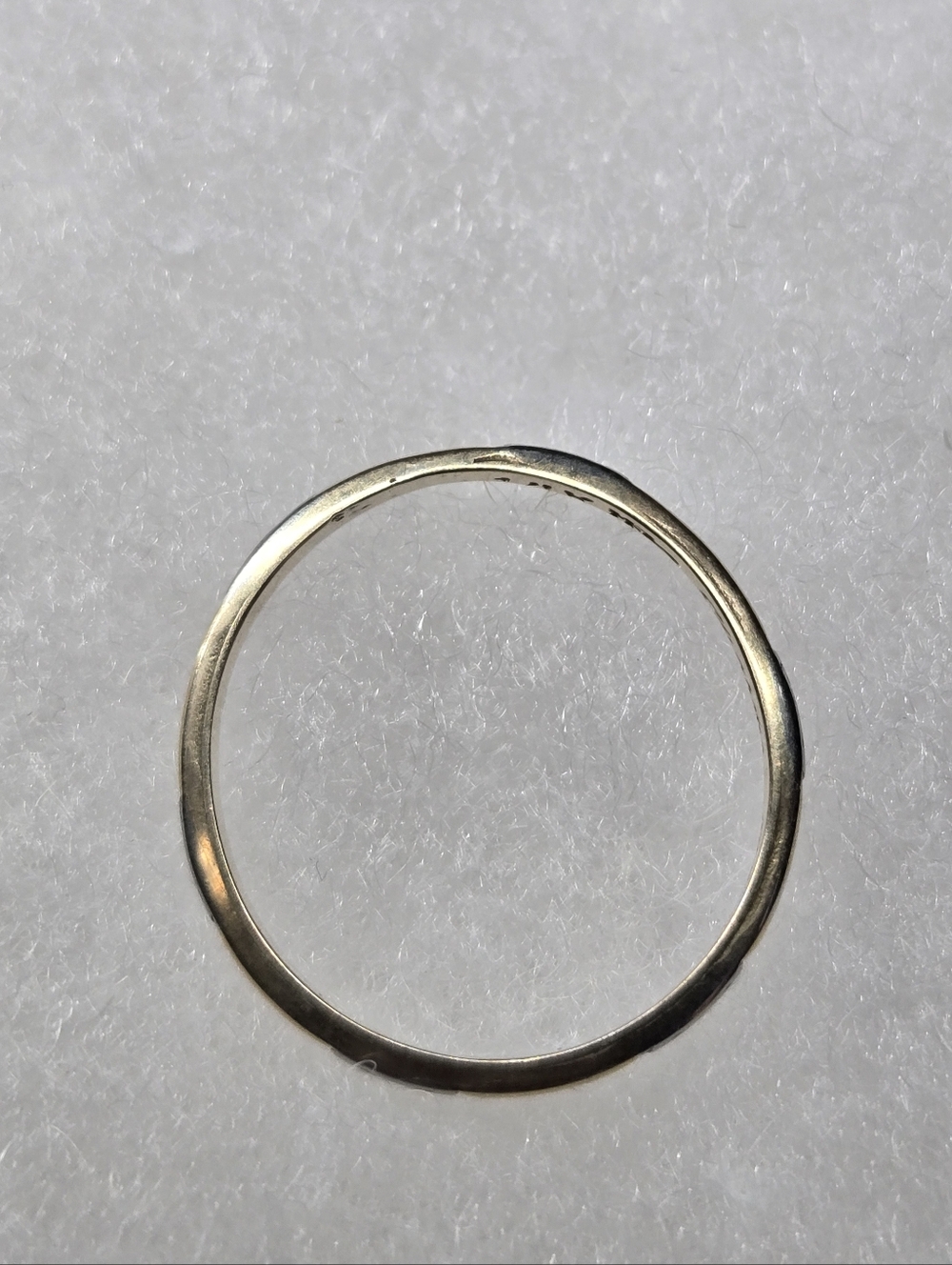 14k Gold Band With Silver Accents
1.42 grams.  Size 7 3/4